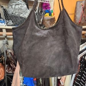 Black suede material woman's shoulder bag
